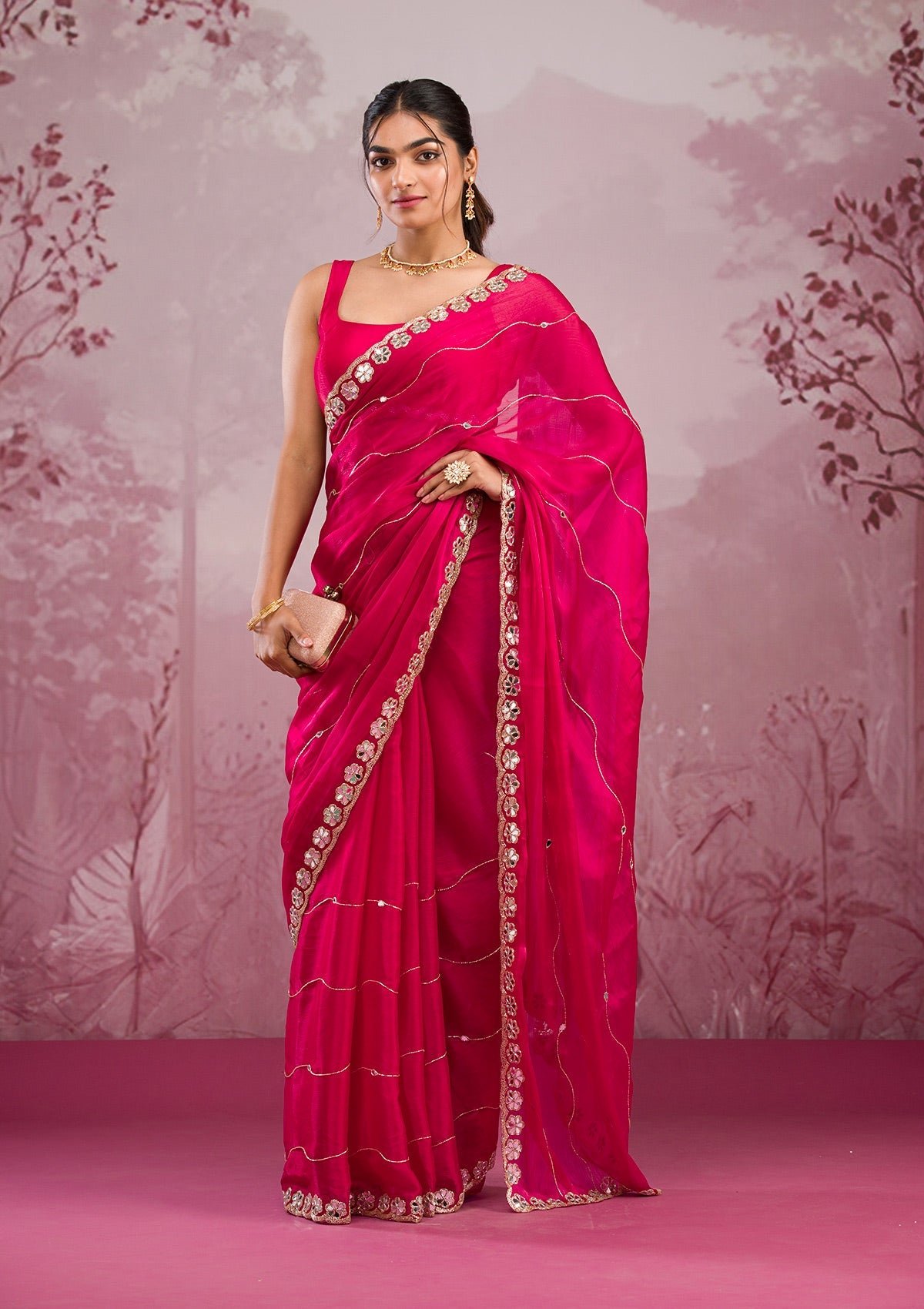 Exquisite Rani Pink Georgette Saree with Stunning Mirrorwork