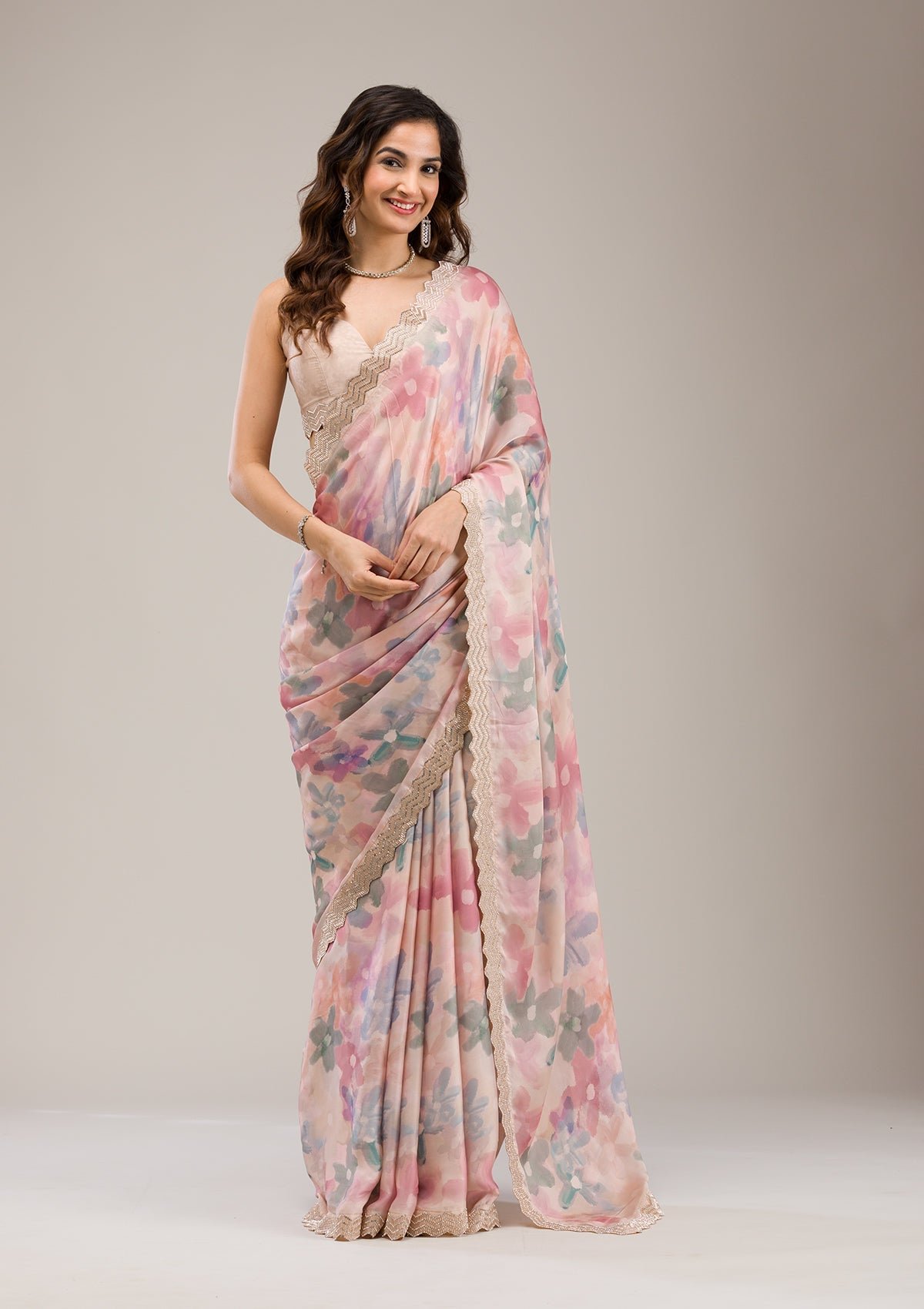 Elegant Beige Georgette Saree with Beautiful Stonework