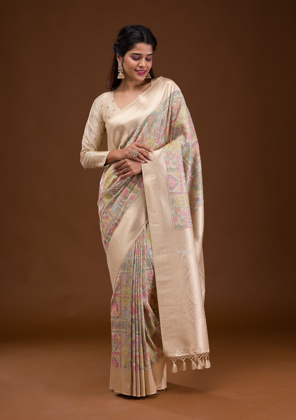 Elegant Cream Banarasi Silk Saree with Intricate Zari Work