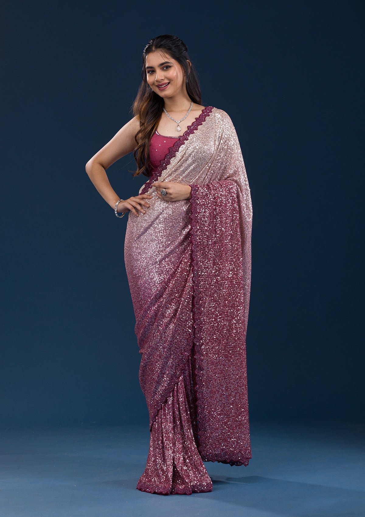 Elegant Maroon Georgette Saree Adorned with Sparkling Sequins