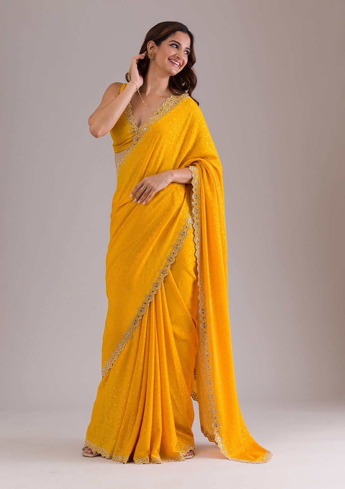 Elegant Mustard Semi Crepe Saree with Exquisite Stonework