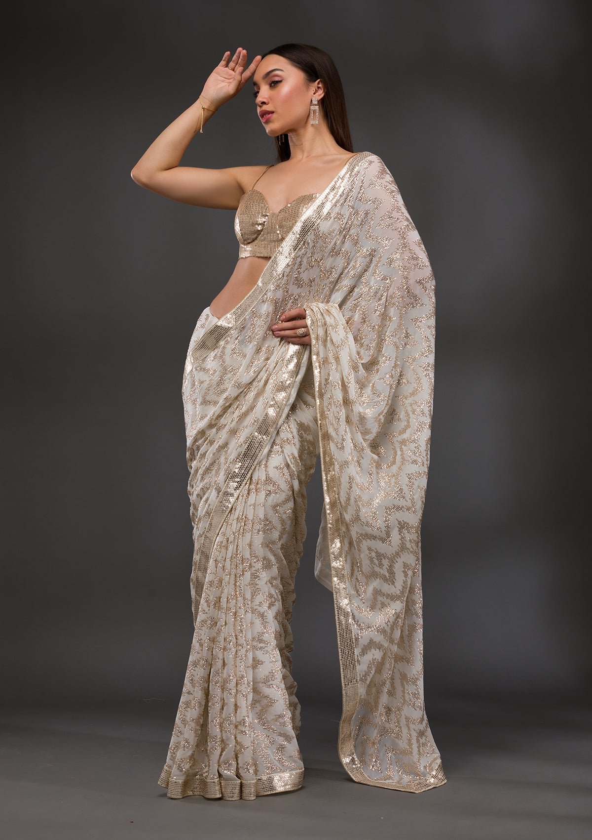 Stunning Off-White Georgette Saree Adorned with Sparkling Sequins