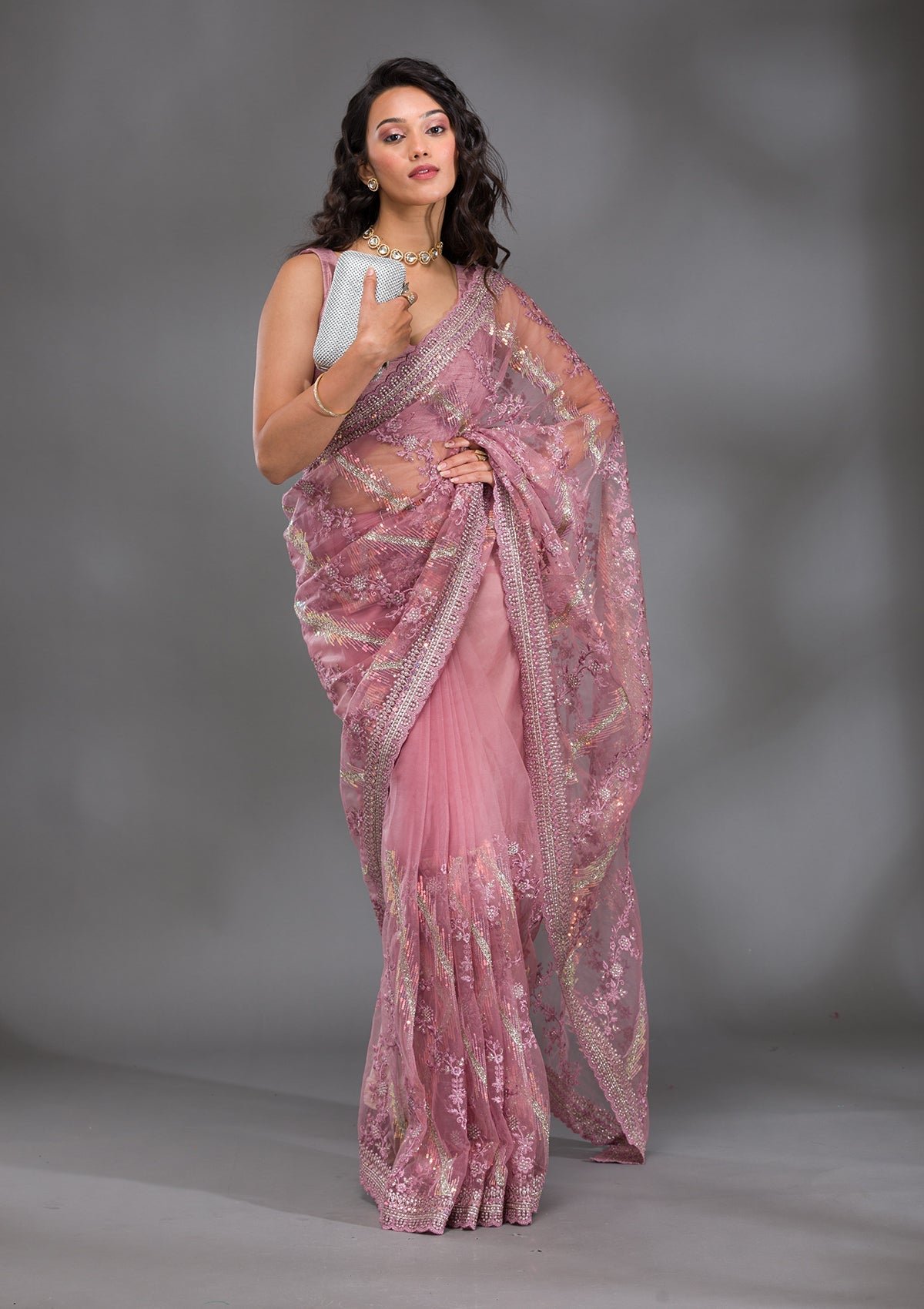 Glamorous Pink Sequined Net Saree with Elegant Onion Hues