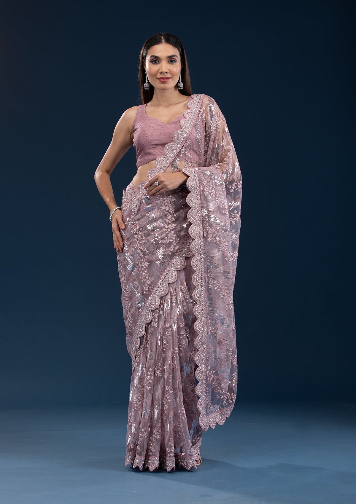 Stunning Pink Sequin Net Saree with Onion Hue
