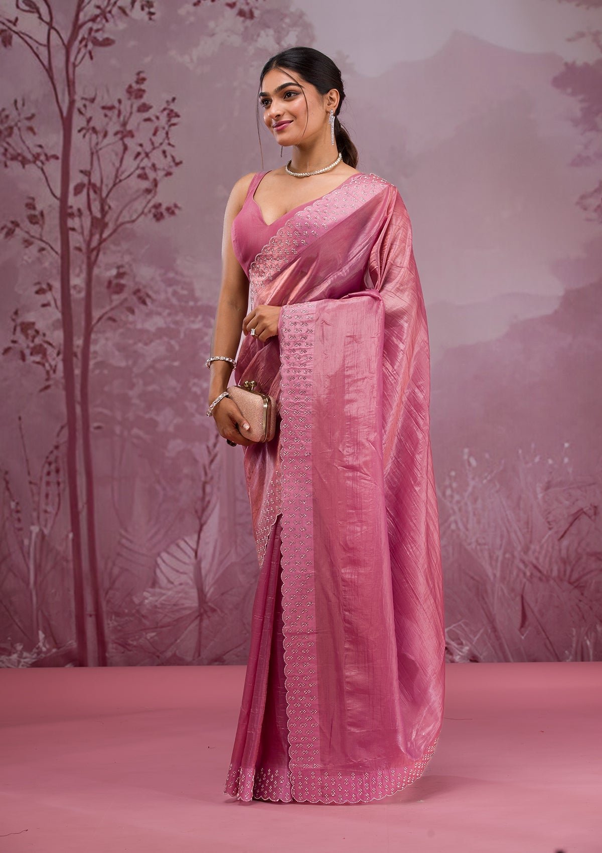 Elegant Onion Pink Tissue Saree Adorned with Sparkling Swarovski Crystals