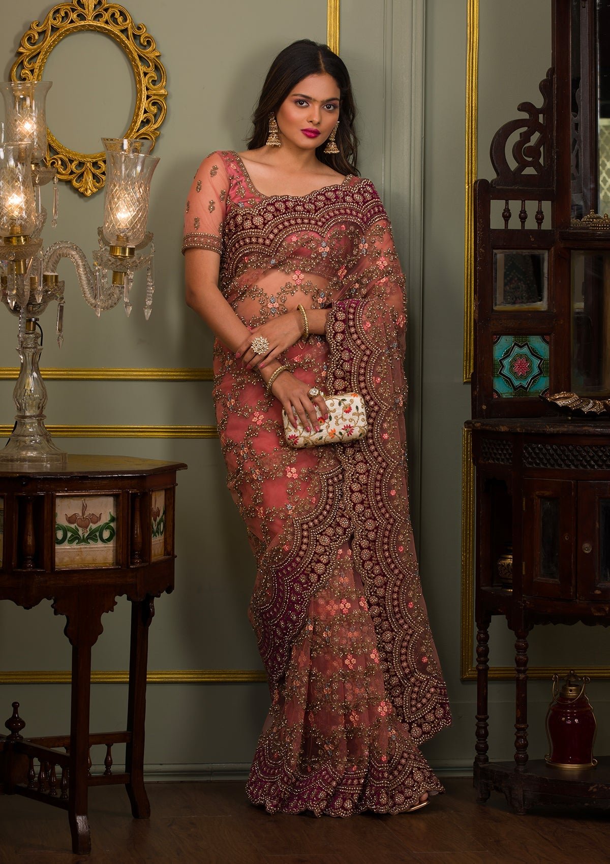 Charming Peach Stonework Net Saree