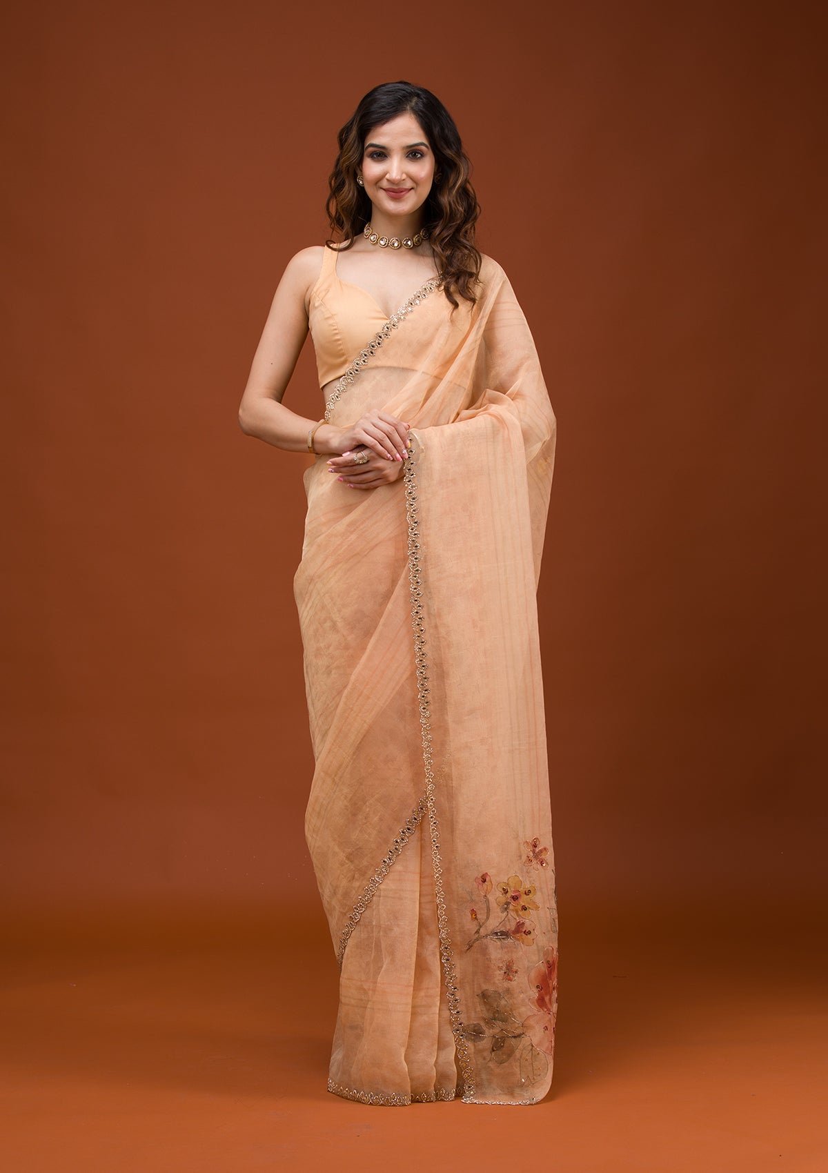 Charming Peach Tissue Saree with Elegant Prints