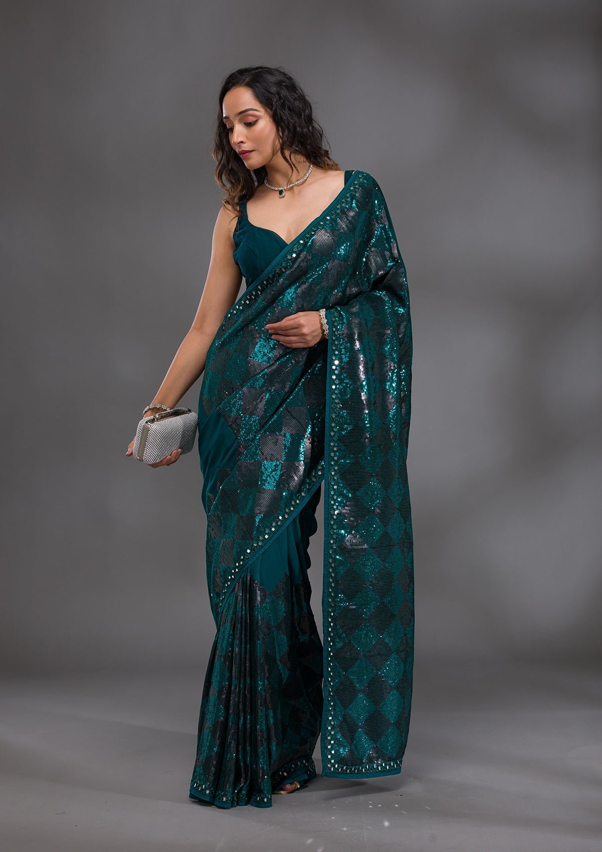 Elegant Peacock Blue Georgette Saree Adorned with Sequins