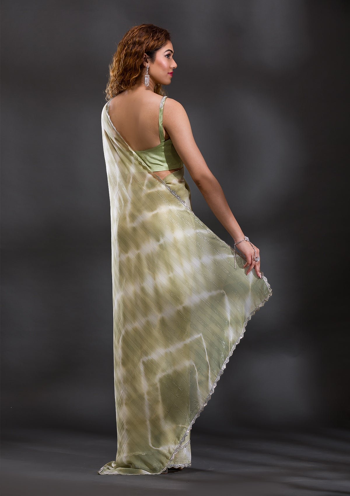 Enchanting Pista Green Georgette Saree with Elegant Stonework and Shimmer - Image 2