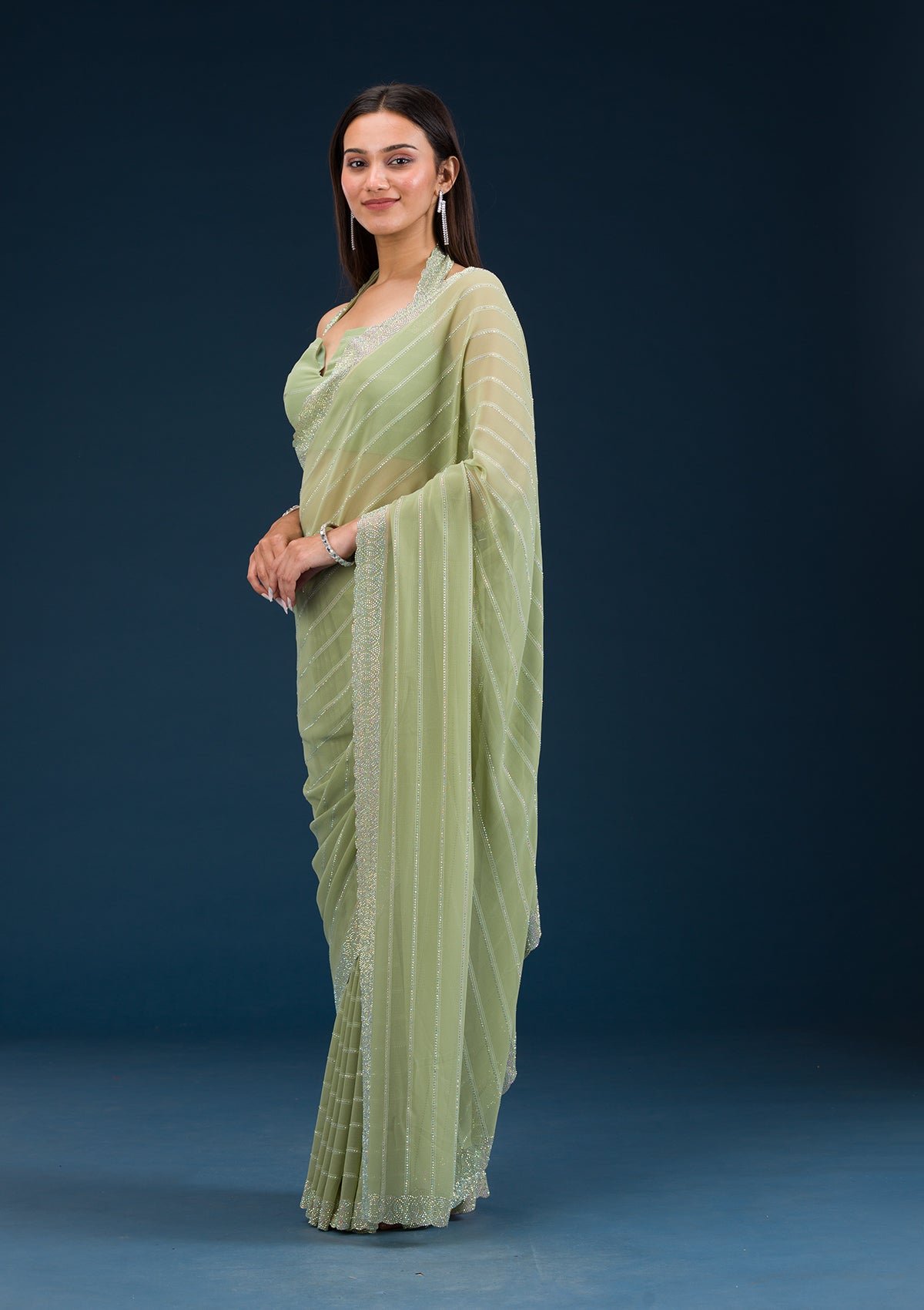 Elegant Pista Green Georgette Saree with Exquisite Stonework - Image 4