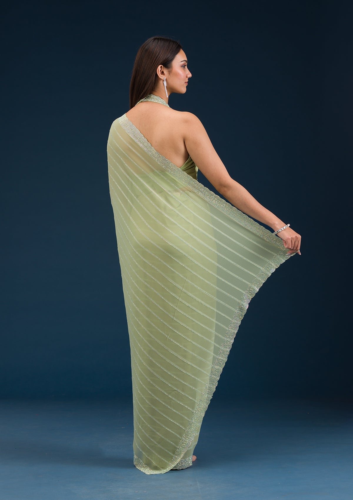 Elegant Pista Green Georgette Saree with Exquisite Stonework - Image 2