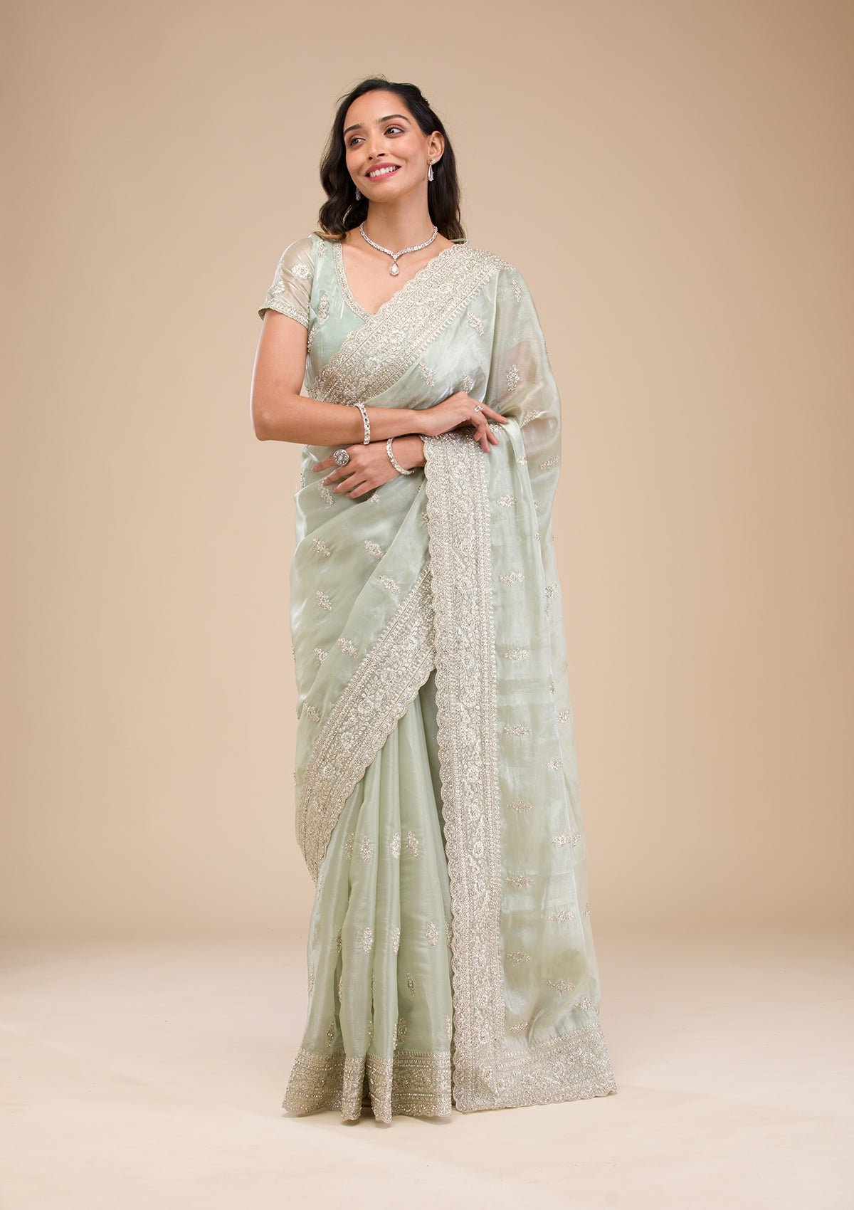 Elegant Pista Green Tissue Saree with Exquisite Zari Work