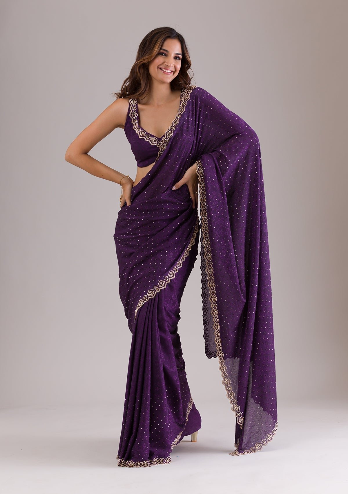 Elegant Purple Semi-Crepe Saree with Stunning Stonework