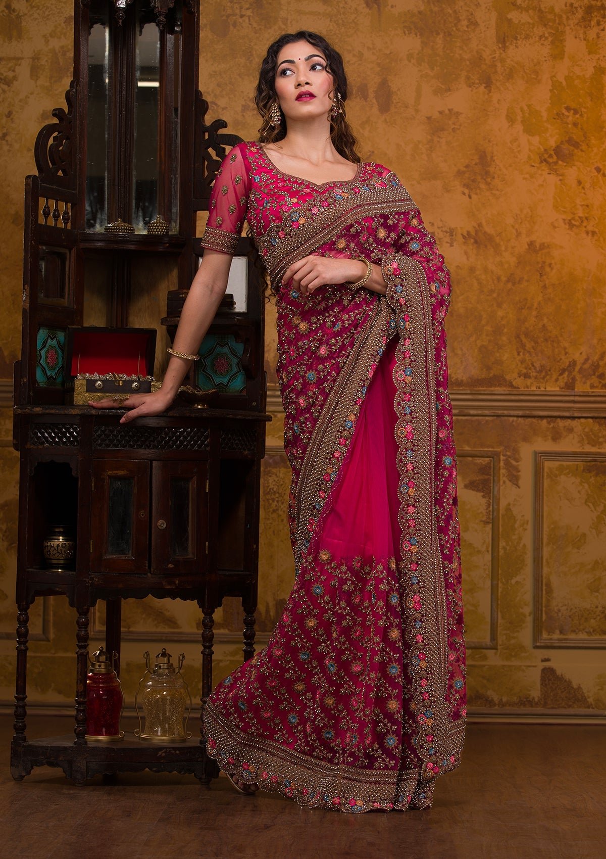 Radiant Rani Pink Zariwork Net Saree for Stunning Elegance