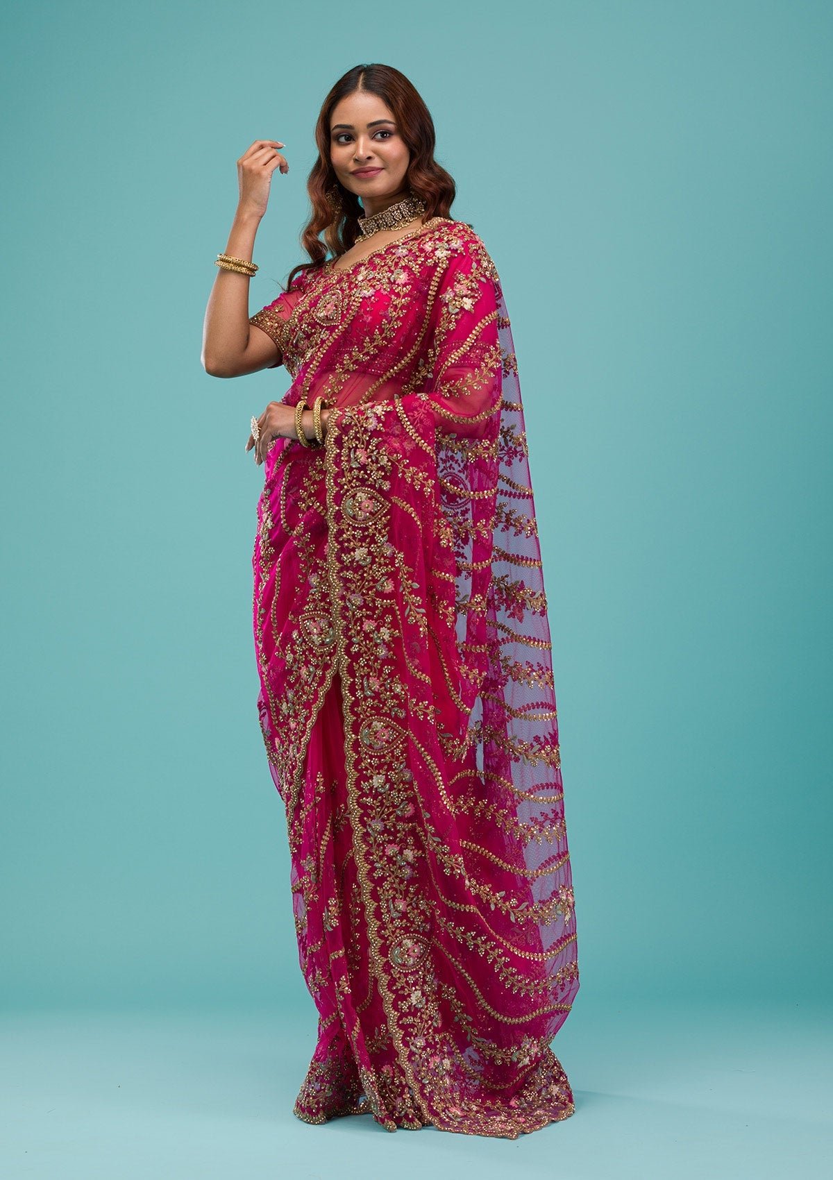 Elegant Rani Pink Net Saree with Exquisite Zari Work