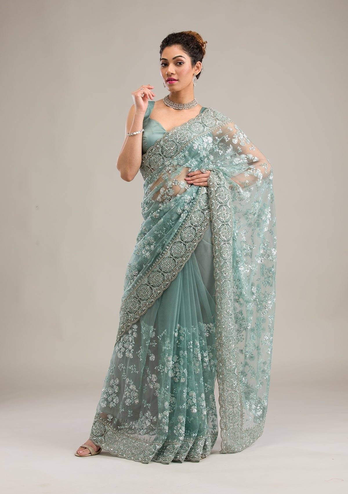 Elegant Sea Green Net Saree with Stunning Zariwork