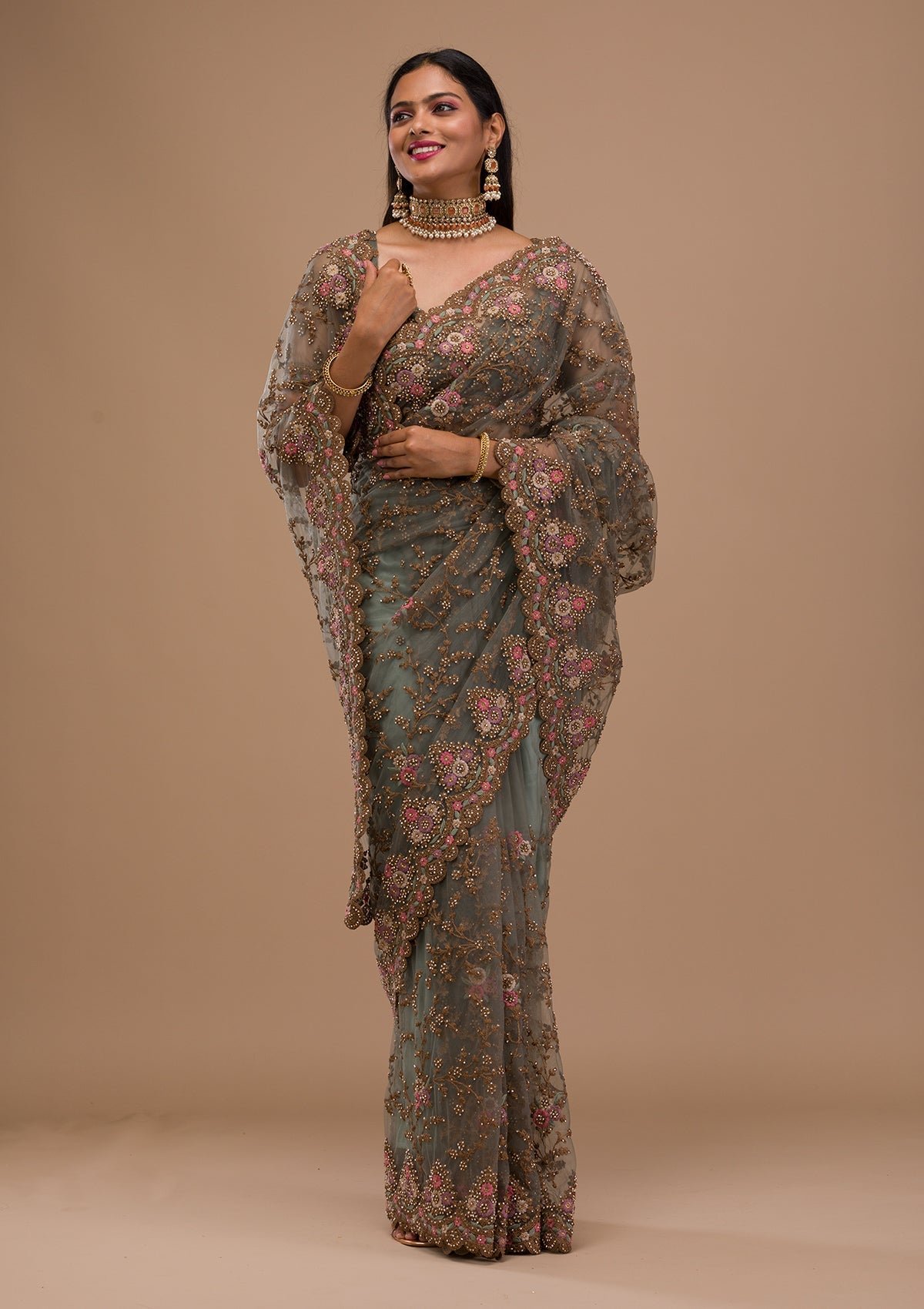 Elegant Sea Green Net Saree with Exquisite Zariwork