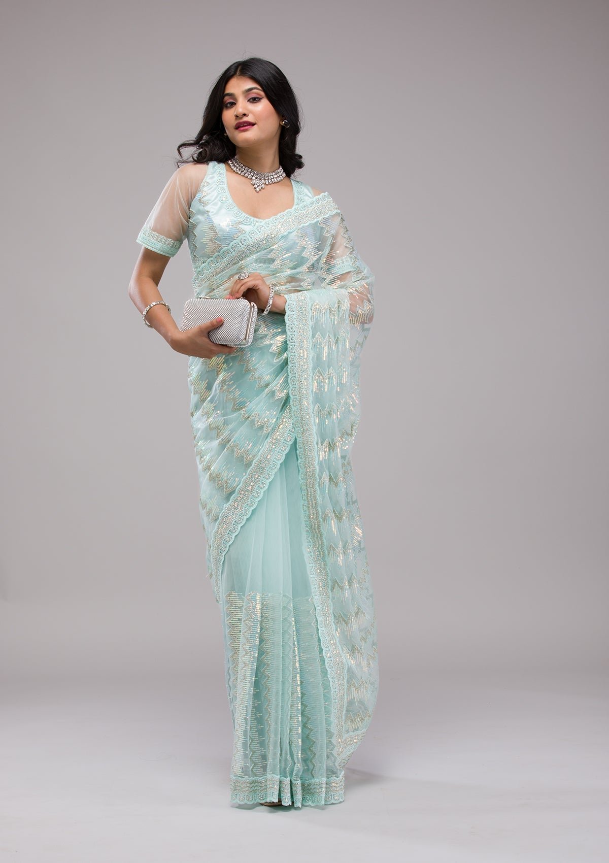 Elegant Sky Blue Sequined Net Saree for a Dazzling Look