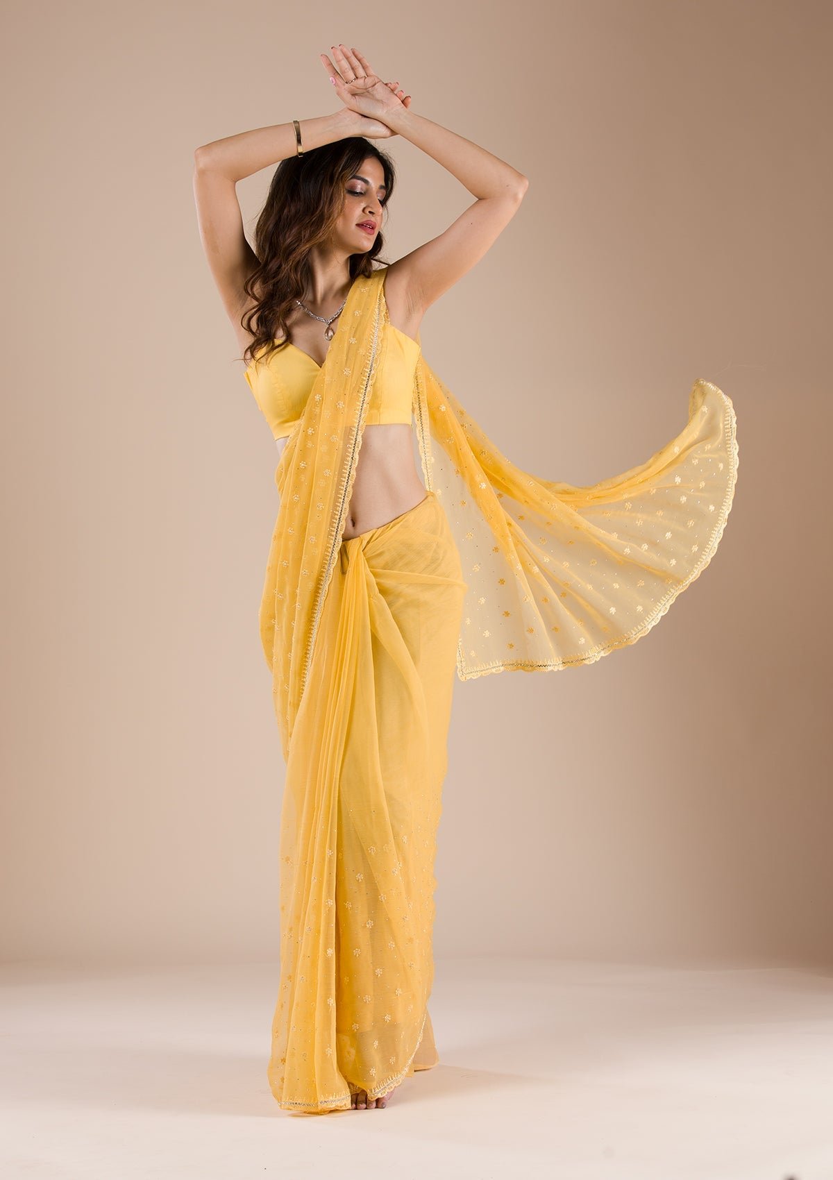 Exquisite Yellow Chiffon Saree with Elegant Threadwork